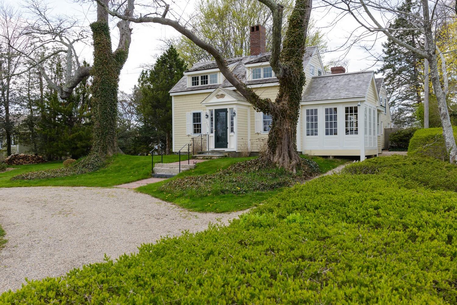 115 Rendezvous Lane Barnstable, MA 02630 - Photo 5 of 34 a front view of a house with garden