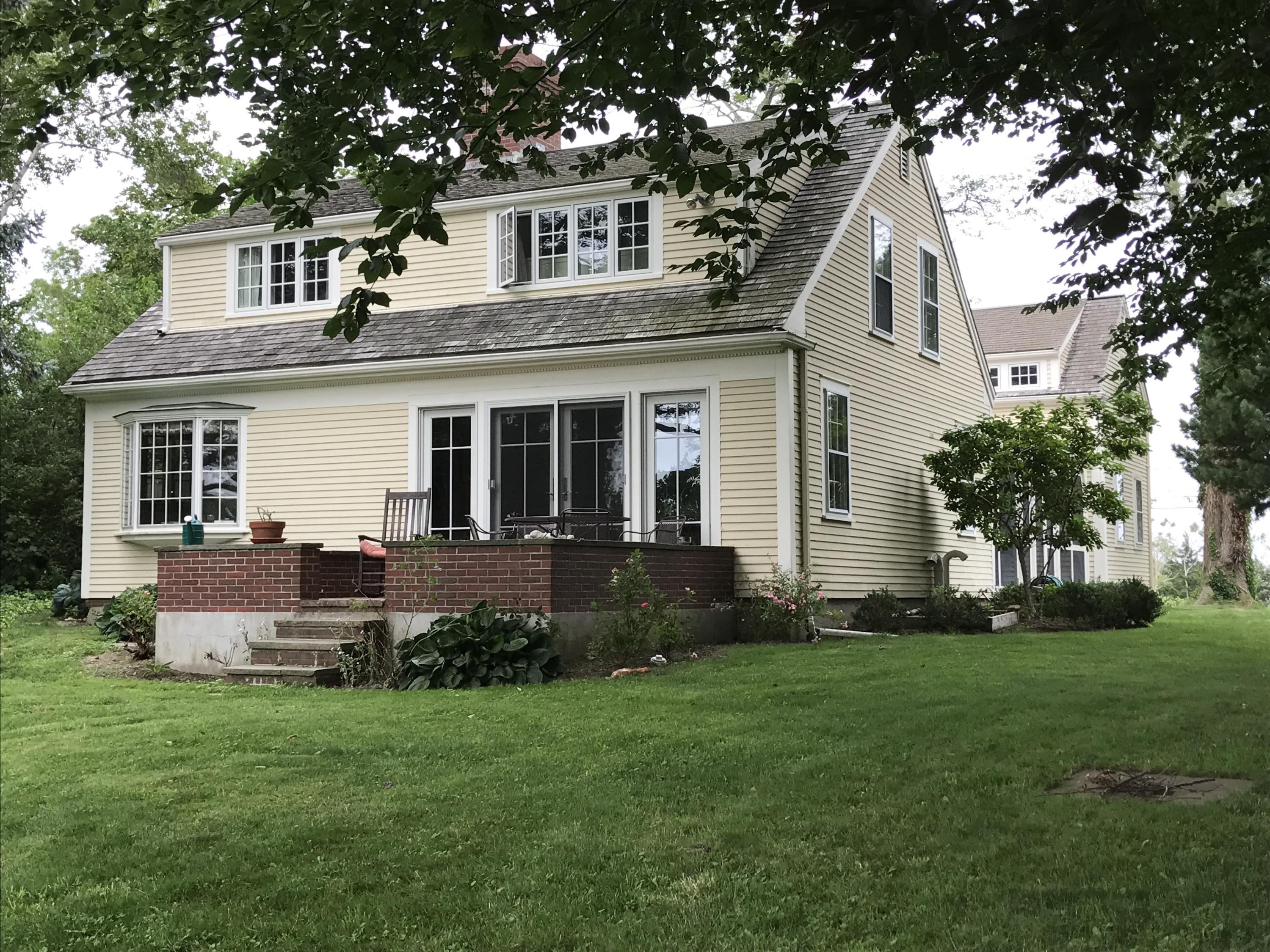 115 Rendezvous Lane Barnstable, MA 02630 - Photo 7 of 34 a front view of house with yard and green space