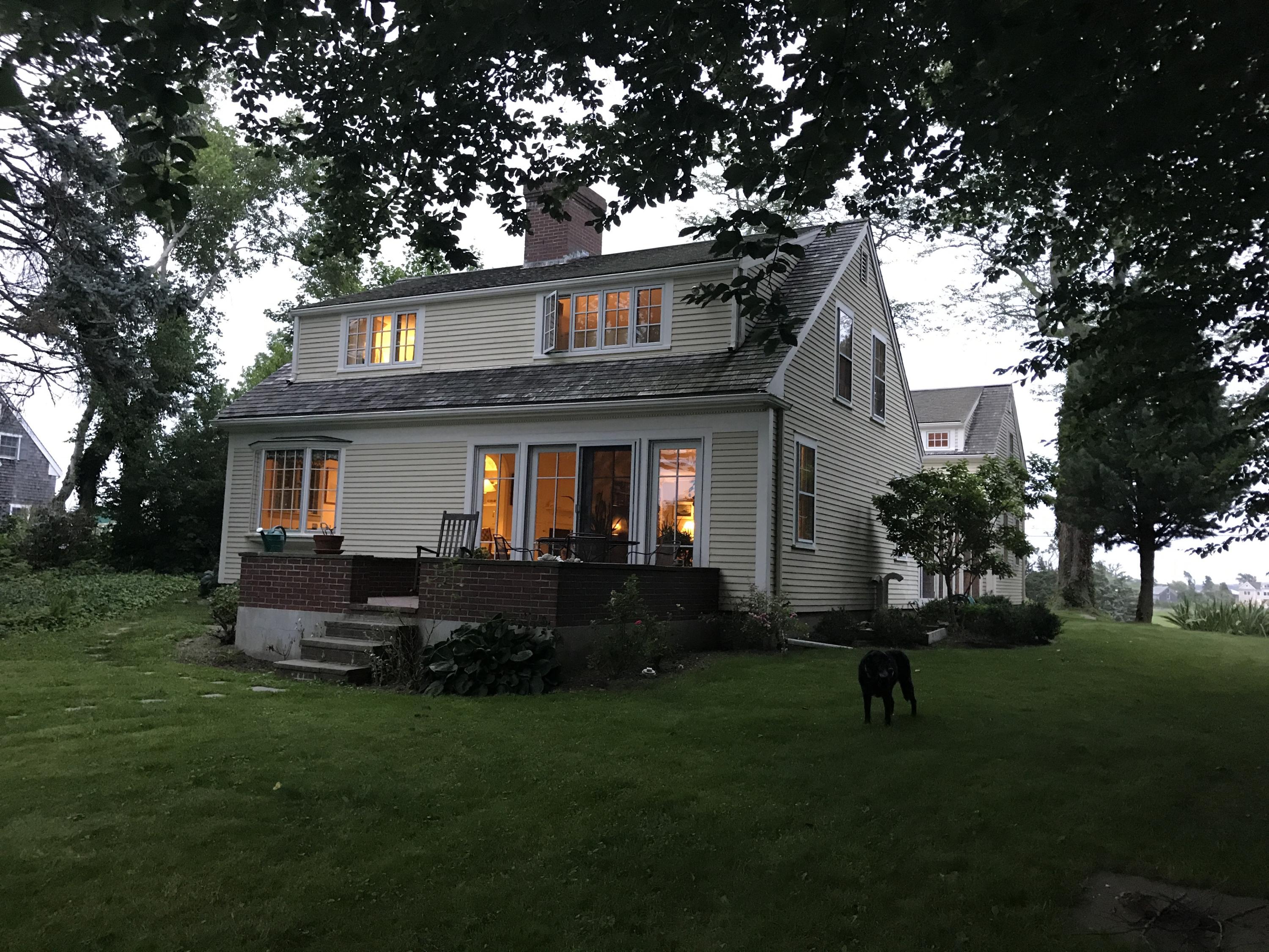 115 Rendezvous Lane Barnstable, MA 02630 - Photo 8 of 34 a front view of a house with a garden