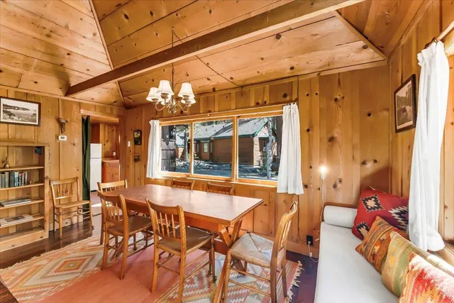 a view of a patio with a table and chairs