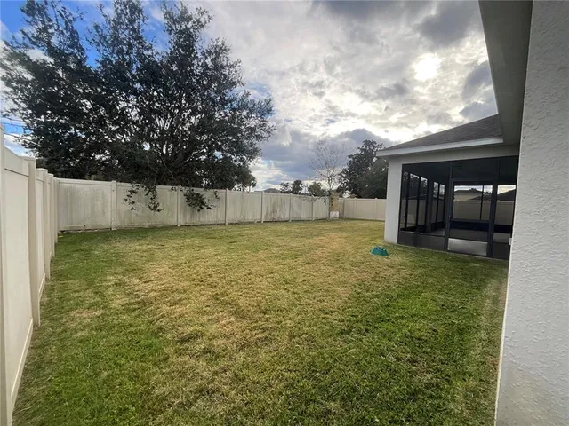 a view of a livingroom with furniture and window