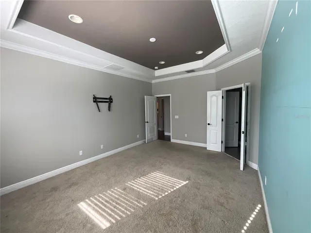 a view of hallway with windows