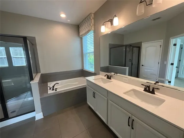 a view of room that has a car parked in it