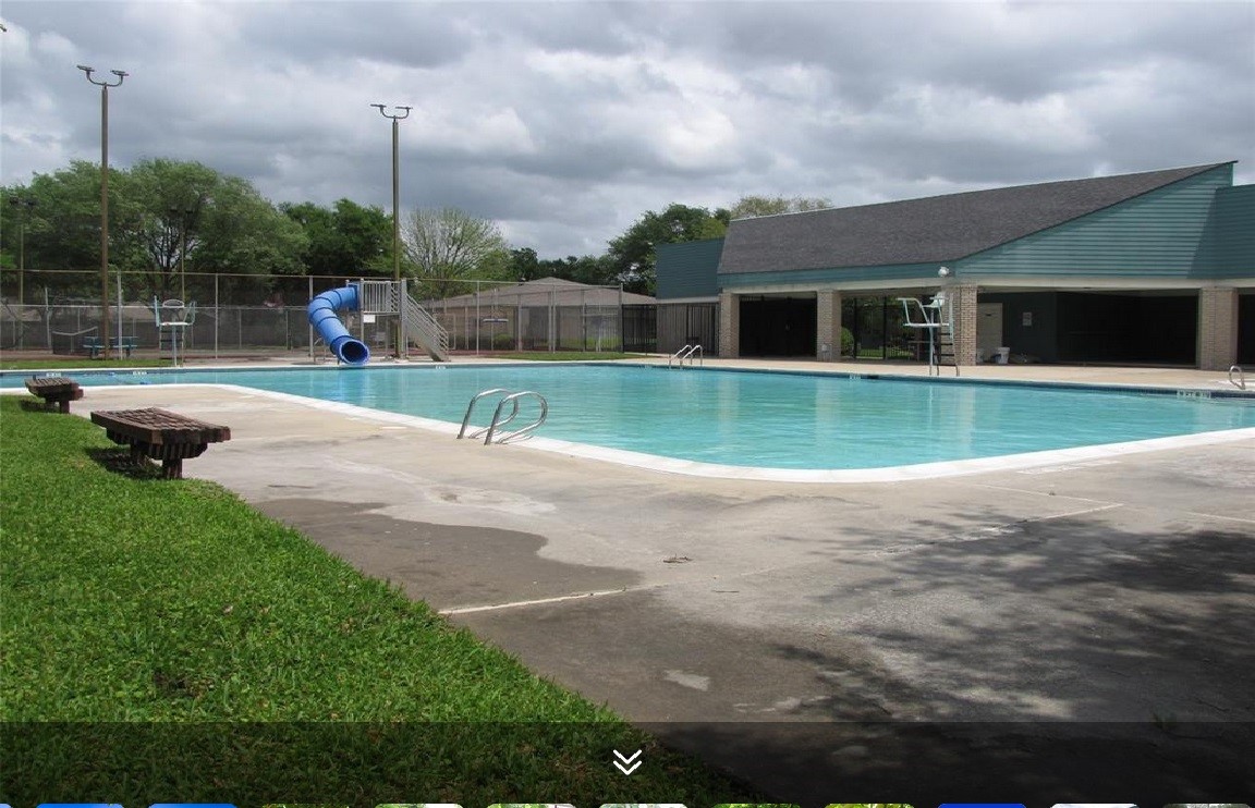 11423 Wickersham Lane Houston, TX 77077 - Photo 31 of 39 a park view with a bench