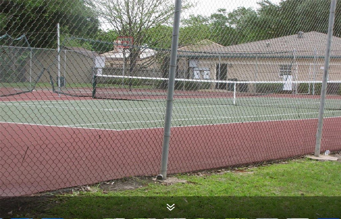 11423 Wickersham Lane Houston, TX 77077 - Photo 33 of 39 a view of a backyard with a fence