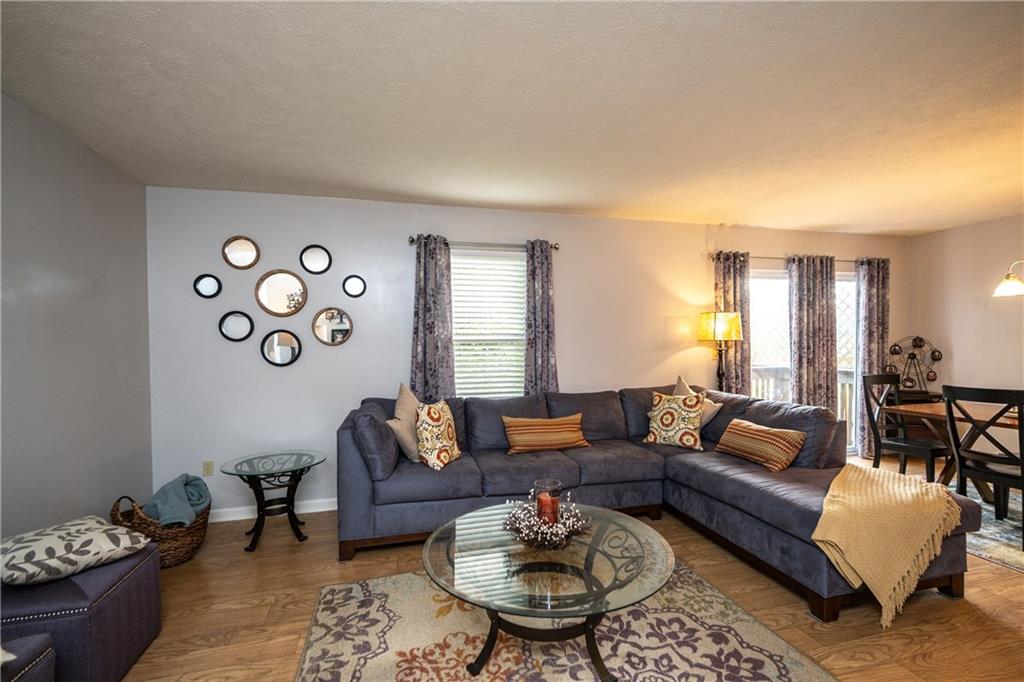2010 Arbor Ridge Court Cheswick, PA 15024 - Photo 2 of 23 Living Room with hardwood floors and natural light.