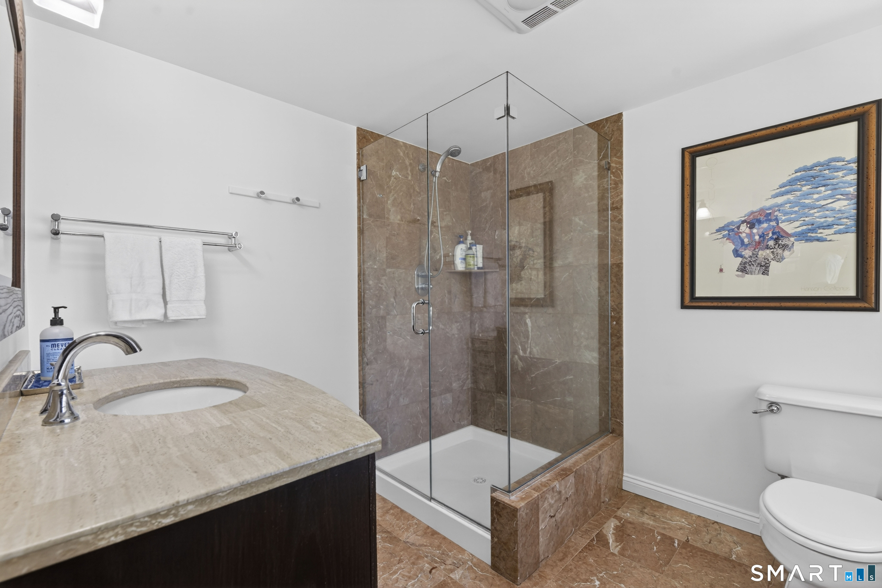 32 Money Point Road Stonington, CT 06355 - Photo 22 of 40 a bathroom with a sink a toilet and shower