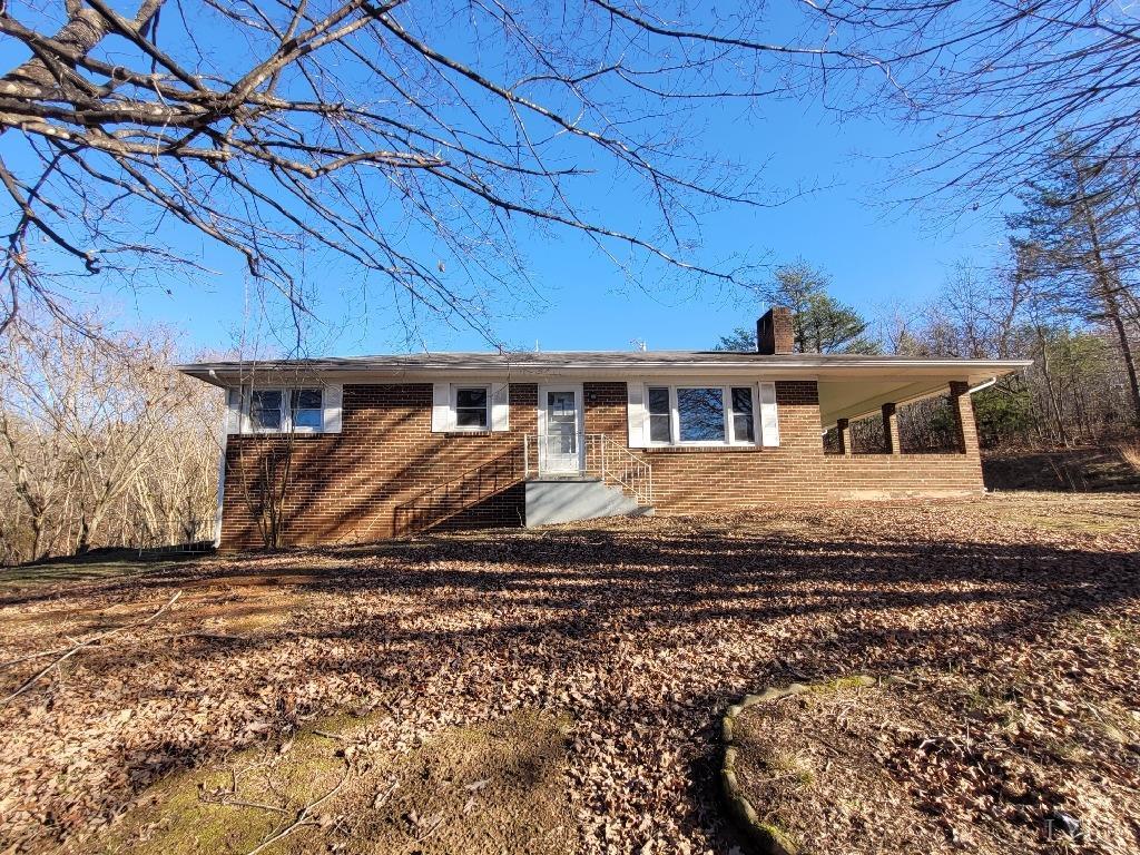 1025 Country Club Road Hurt, VA 24563 - Photo 1 of 15 a view of a house with a yard