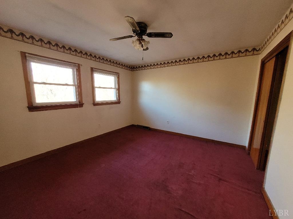 1025 Country Club Road Hurt, VA 24563 - Photo 12 of 15 a view of an empty room with a window