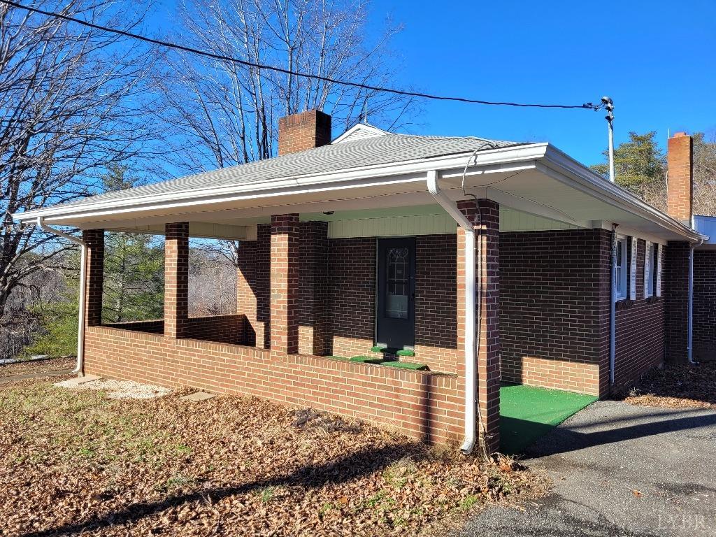 1025 Country Club Road Hurt, VA 24563 - Photo 2 of 15 a view of a house with a patio