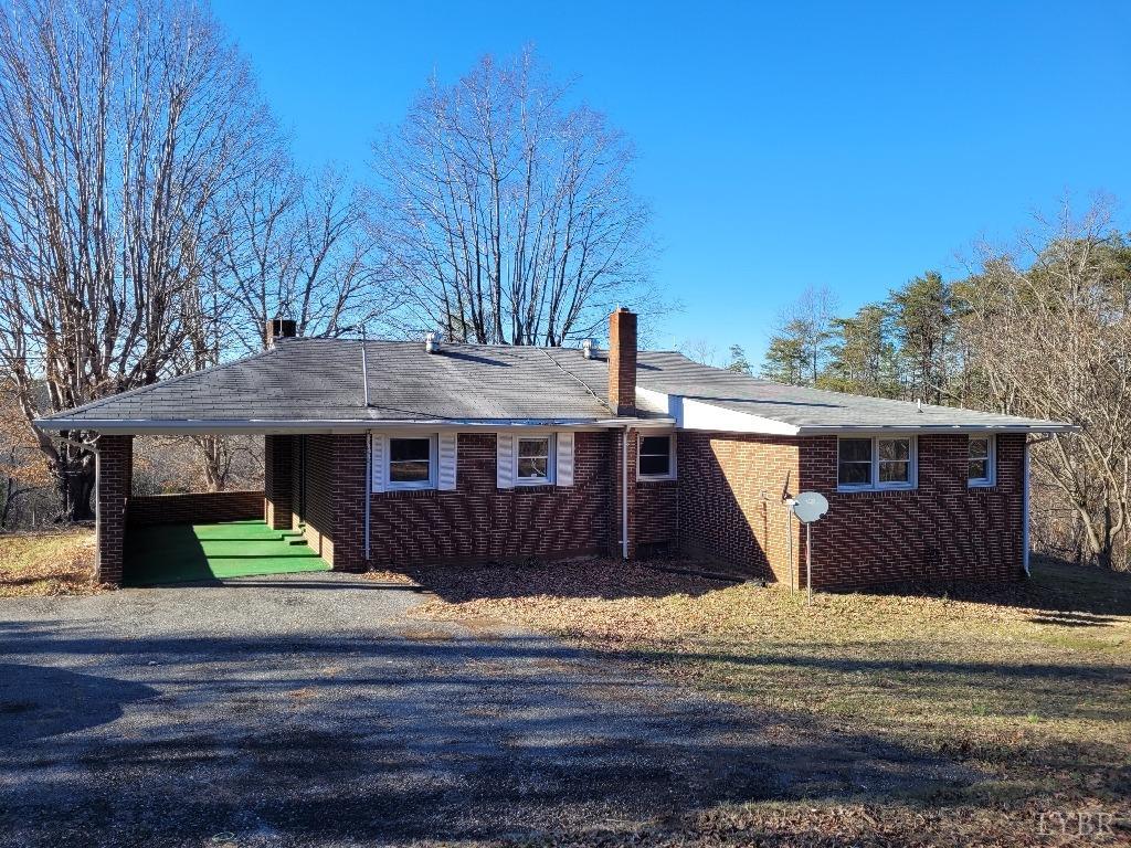 1025 Country Club Road Hurt, VA 24563 - Photo 3 of 15 a front view of a house with a yard