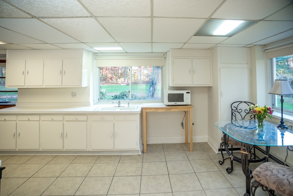 50 Mueller Road Holyoke, MA 01040 - Photo 25 of 30 a kitchen with cabinets and window