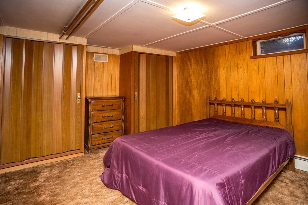 50 Mueller Road Holyoke, MA 01040 - Photo 28 of 30 a bedroom with a bed and a dresser