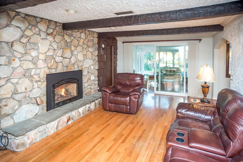 50 Mueller Road Holyoke, MA 01040 - Photo 8 of 30 a living room with furniture and a fireplace