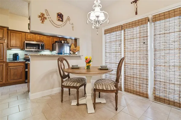 a view of a dining room with furniture