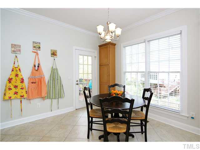 6 Kilary Drive Durham, NC 27713 - Photo 13 of 25 a dining room with furniture and wooden floor