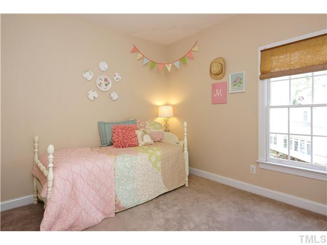 6 Kilary Drive Durham, NC 27713 - Photo 19 of 25 a bedroom with a bed and a window