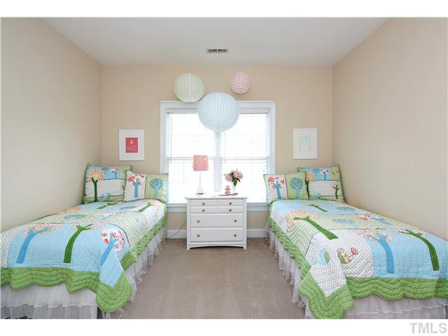 6 Kilary Drive Durham, NC 27713 - Photo 20 of 25 a bedroom with a bed and a large window