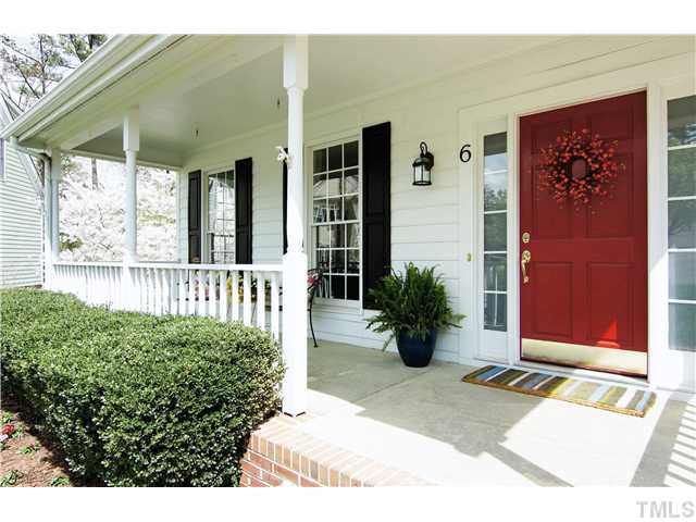 6 Kilary Drive Durham, NC 27713 - Photo 2 of 25 a view of a porch with potted plants