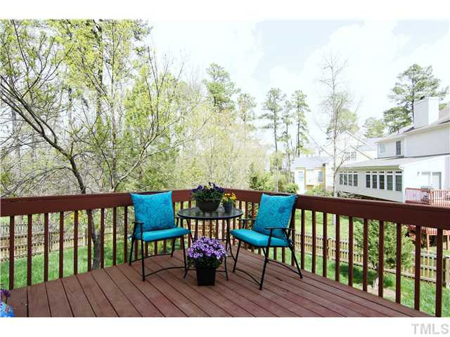 6 Kilary Drive Durham, NC 27713 - Photo 23 of 25 a view of a chairs and table on the deck