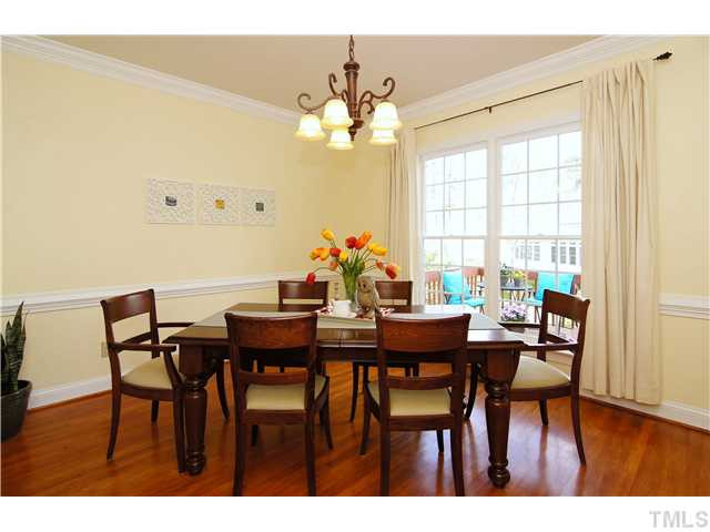 6 Kilary Drive Durham, NC 27713 - Photo 8 of 25 a view of a dining room with furniture and wooden floor