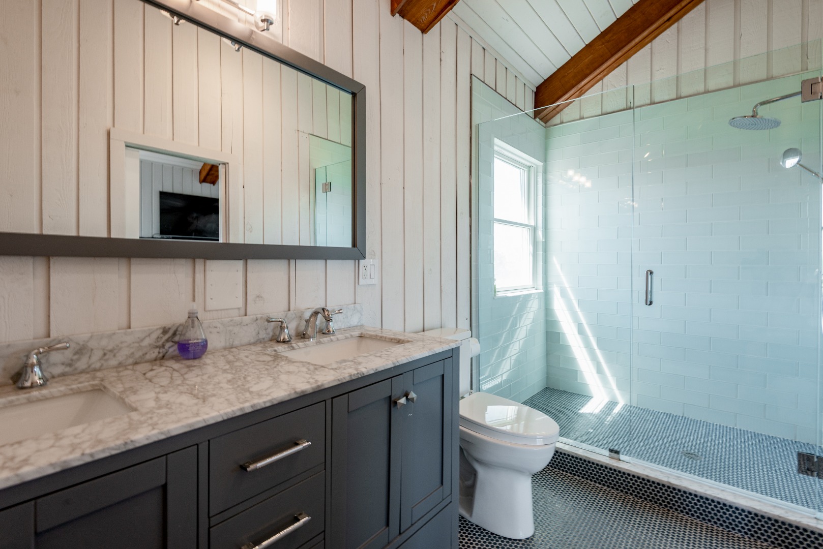 1 Reeds Way Nantucket, MA 02554 - Photo 37 of 51 a bathroom with a granite countertop sink toilet a mirror and shower