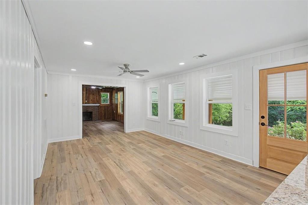 2115 King Road Dalton, GA 30720 - Photo 14 of 54 a view of empty room with wooden floor and fan