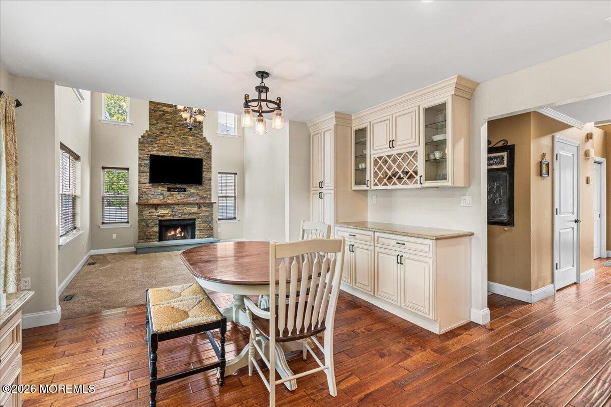 49 Diamond Lane Howell, NJ 07731 - Photo 11 of 46 a view of kitchen with cabinets and wooden floor