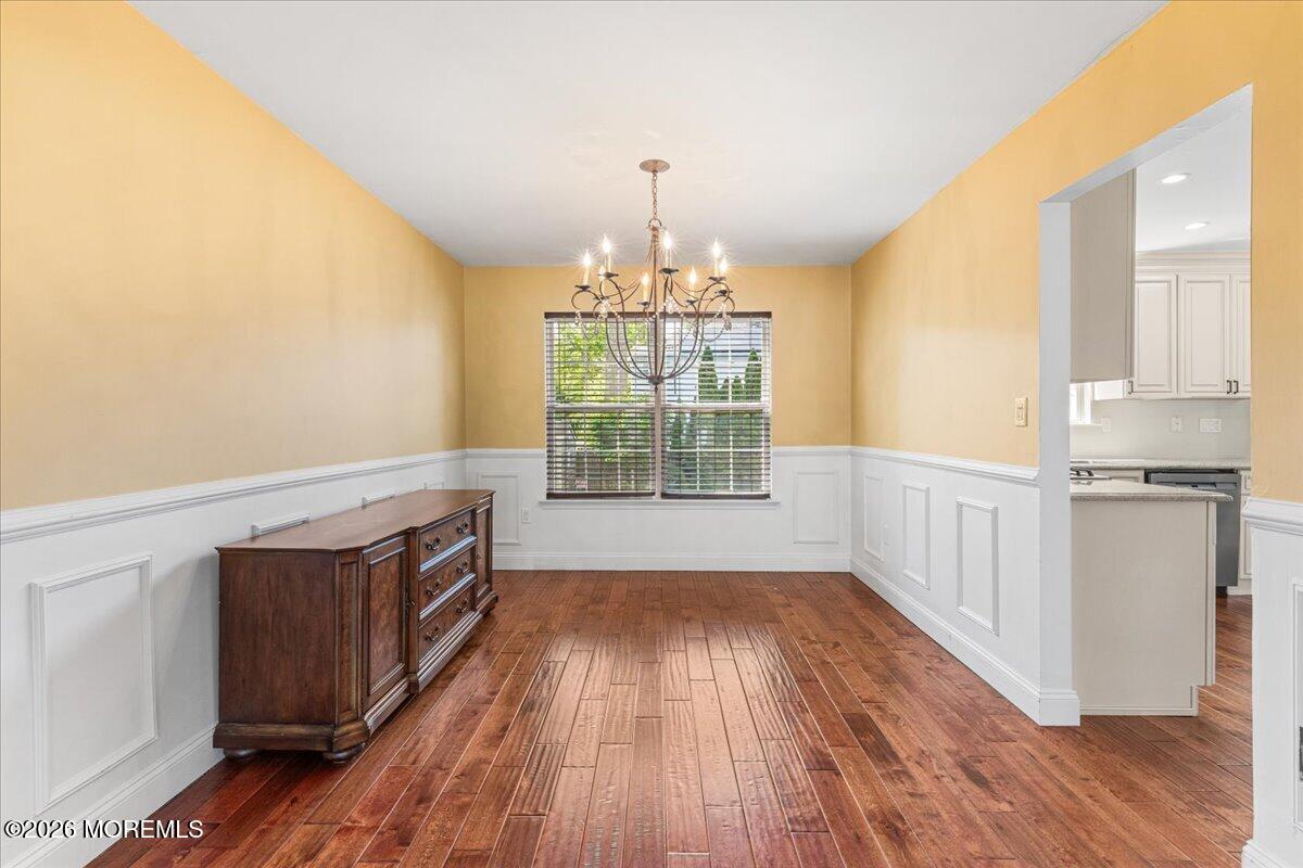 49 Diamond Lane Howell, NJ 07731 - Photo 15 of 46 wooden floor in an empty room with a window