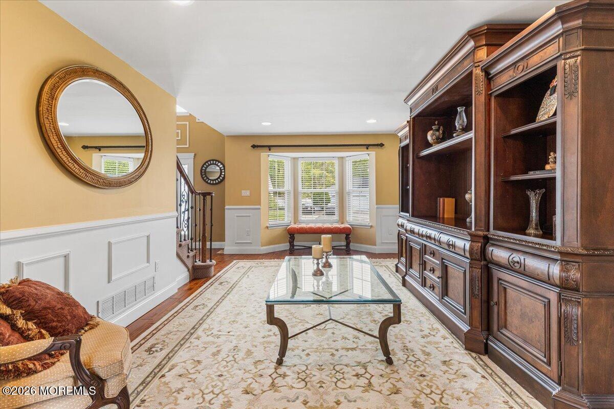 49 Diamond Lane Howell, NJ 07731 - Photo 16 of 46 a living room with furniture a rug and a window