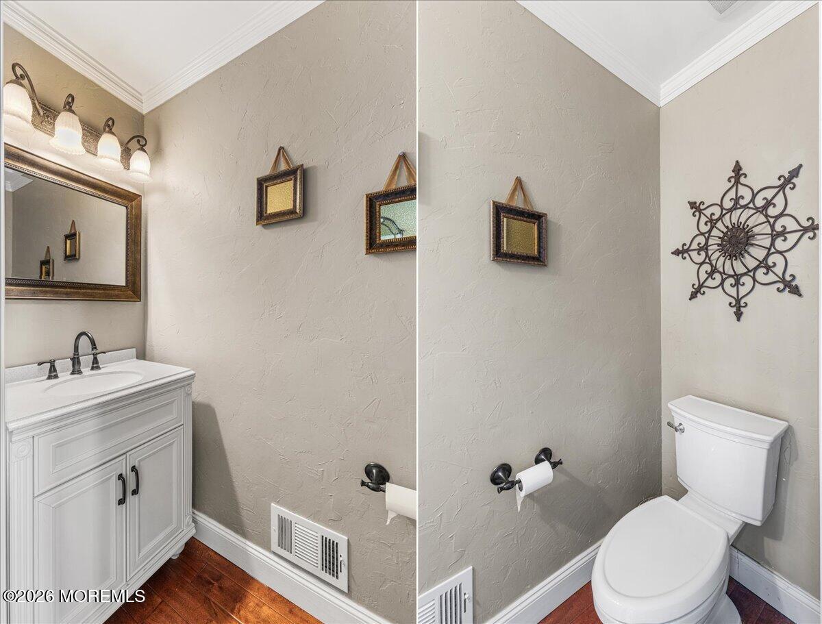49 Diamond Lane Howell, NJ 07731 - Photo 18 of 46 a bathroom with a toilet sink and mirror