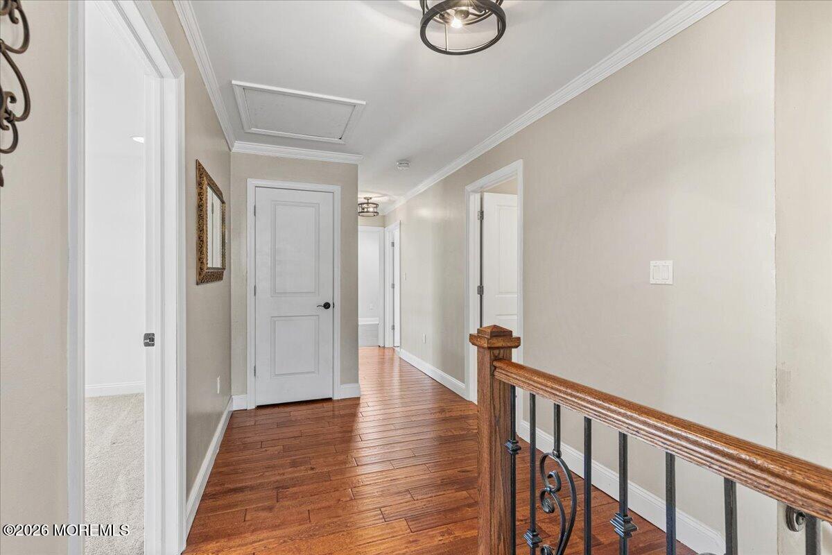 49 Diamond Lane Howell, NJ 07731 - Photo 19 of 46 a view of a hallway with wooden floor