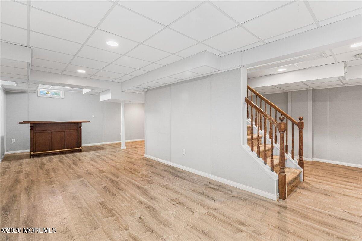 49 Diamond Lane Howell, NJ 07731 - Photo 29 of 46 a view of an empty room with wooden floor