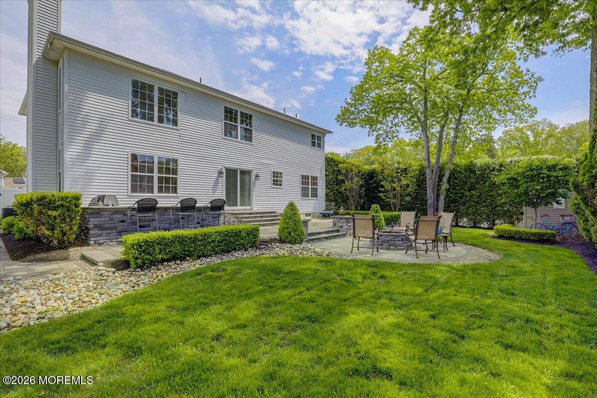 49 Diamond Lane Howell, NJ 07731 - Photo 37 of 46 a view of a house with backyard and sitting area