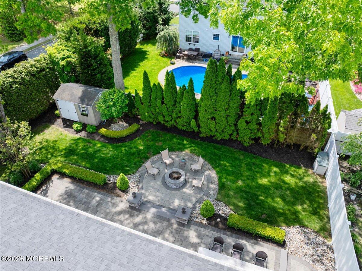 49 Diamond Lane Howell, NJ 07731 - Photo 38 of 46 an aerial view of a house with a yard and outdoor seating