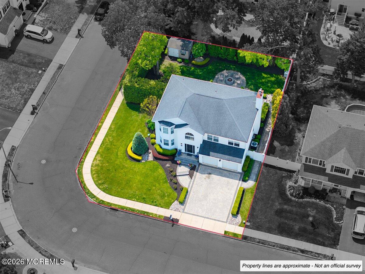 49 Diamond Lane Howell, NJ 07731 - Photo 40 of 46 an aerial view of a house with a garden and swimming pool
