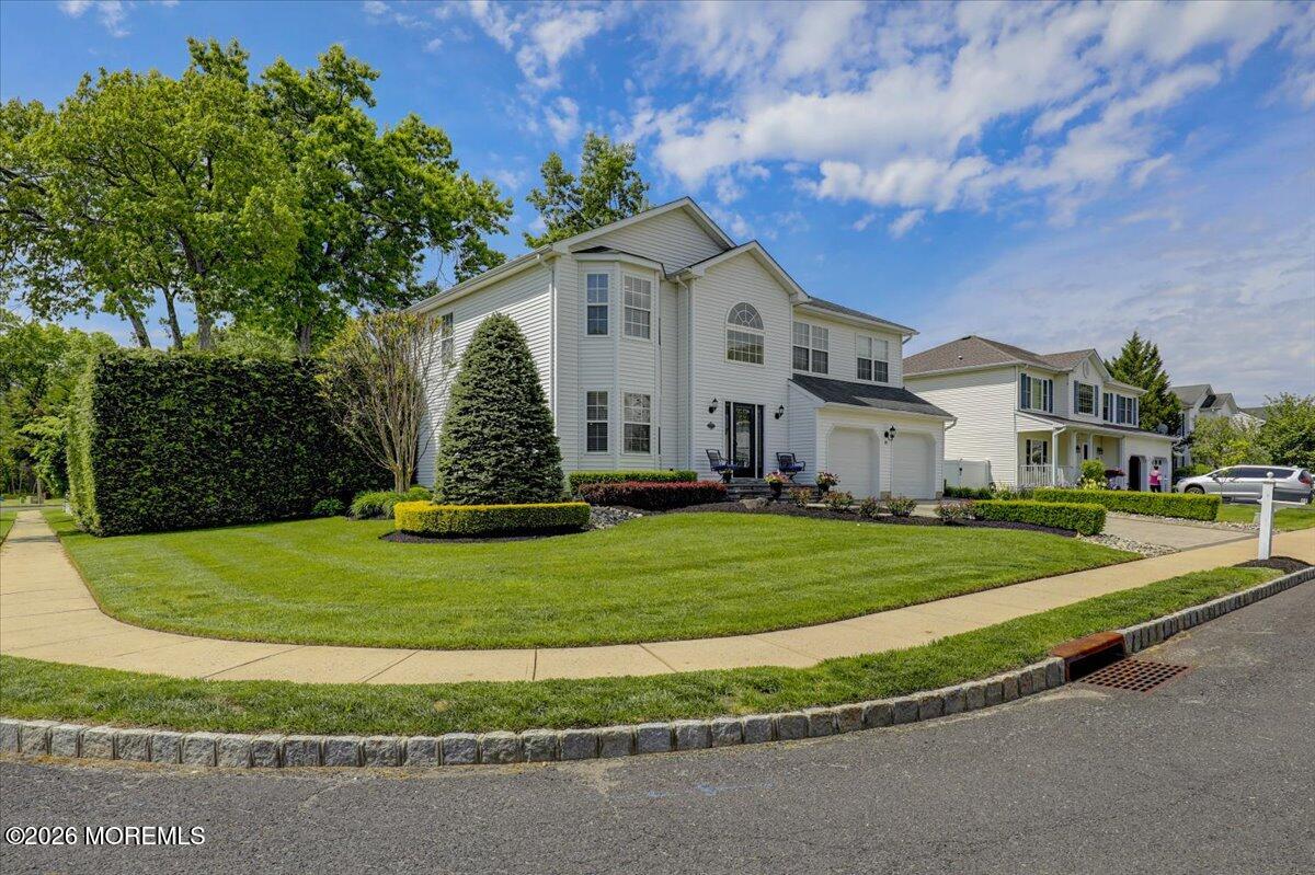 49 Diamond Lane Howell, NJ 07731 - Photo 5 of 46 a front view of a house with a yard