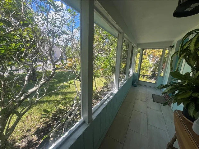 a view of a garden from a balcony