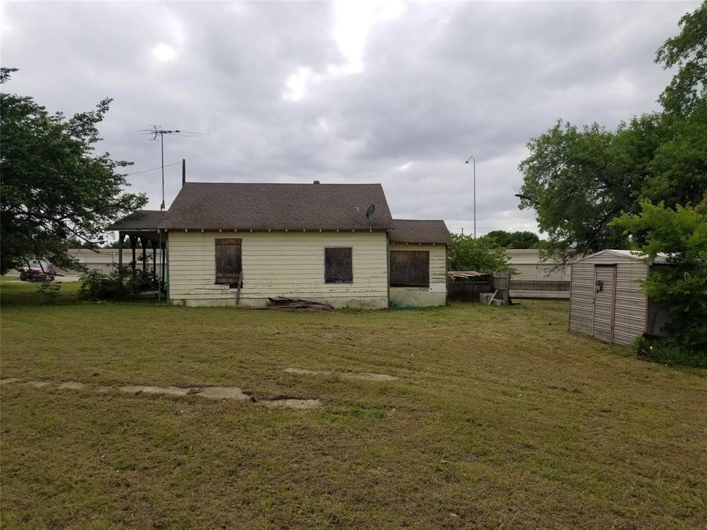 5808 President George Bush Highway Rowlett, TX 75089 - Photo 7 of 10 a front view of a house with a garden