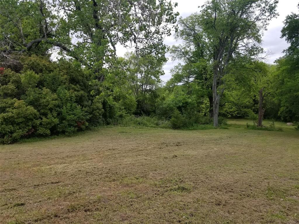 5808 President George Bush Highway Rowlett, TX 75089 - Photo 10 of 10 a view of a field with trees in background