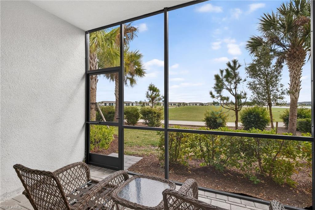 43985 Boardwalk Loop, Unit 2115 Punta Gorda, FL 33982 - Photo 18 of 28 a balcony view with a couch