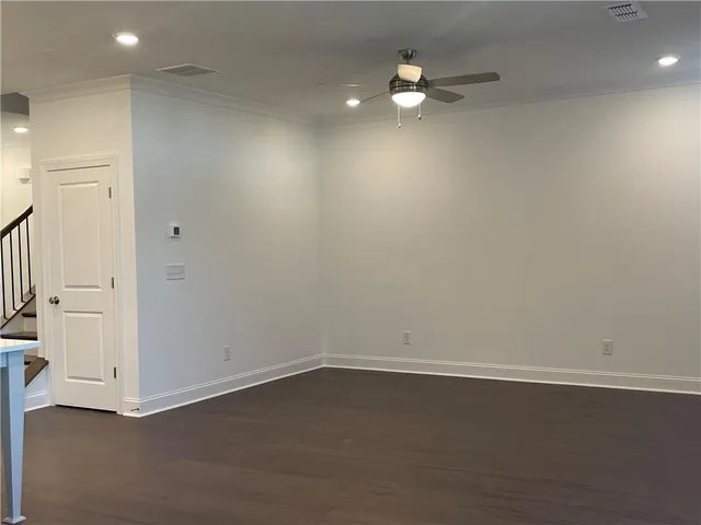 a kitchen with a sink and a refrigerator