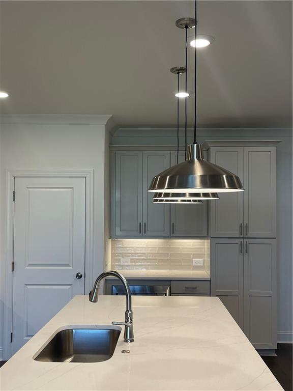 4807 Larkin Pass Buford, GA 30518 - Photo 21 of 58 a kitchen with a sink and cabinets