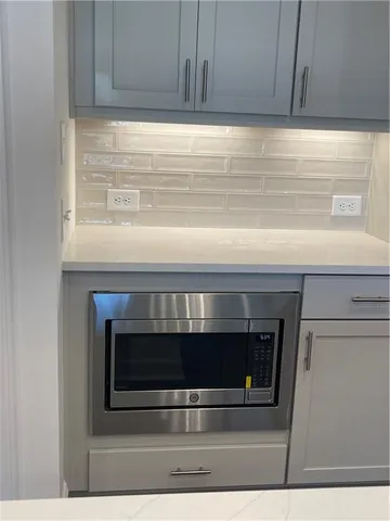 a white building with a fireplace