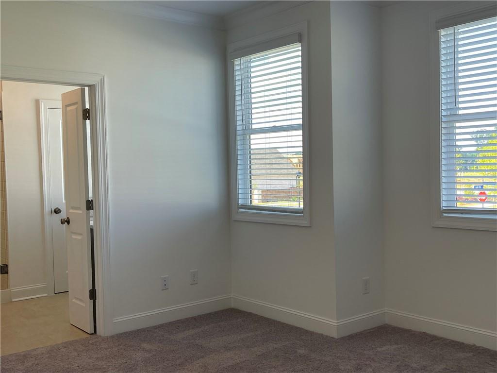 4807 Larkin Pass Buford, GA 30518 - Photo 31 of 58 an empty room with a window
