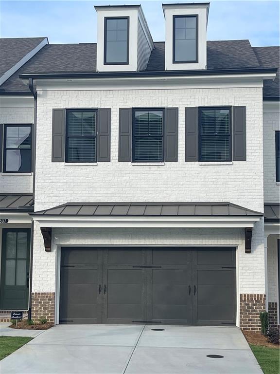 4807 Larkin Pass Buford, GA 30518 - Photo 56 of 58 a kitchen with a stove and cabinets