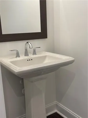 a kitchen with kitchen island a large counter top a appliances and cabinets