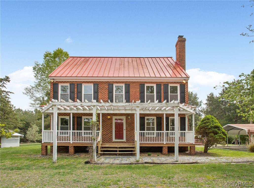3800 Bailey Farm Road Moseley, VA 23120 - Photo 1 of 48 a front view of a house with a yard