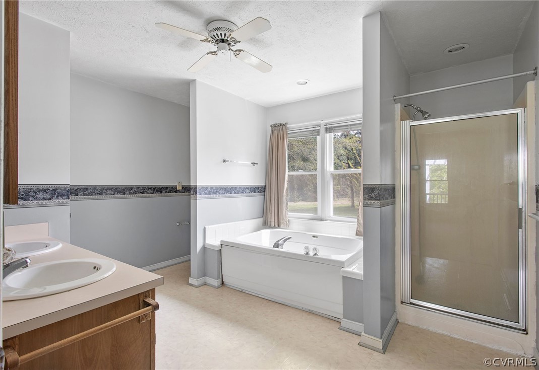 3800 Bailey Farm Road Moseley, VA 23120 - Photo 13 of 48 a bathroom with a tub sink and mirror