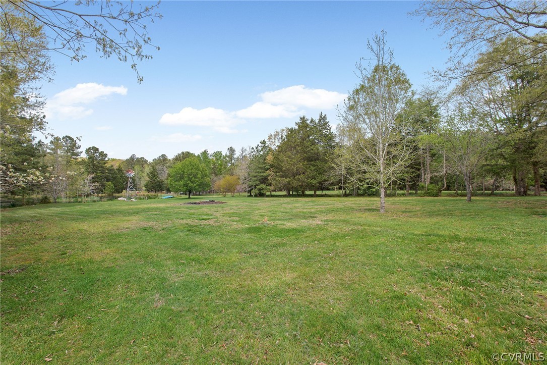 3800 Bailey Farm Road Moseley, VA 23120 - Photo 45 of 48 a view of outdoor space with green field and trees all around